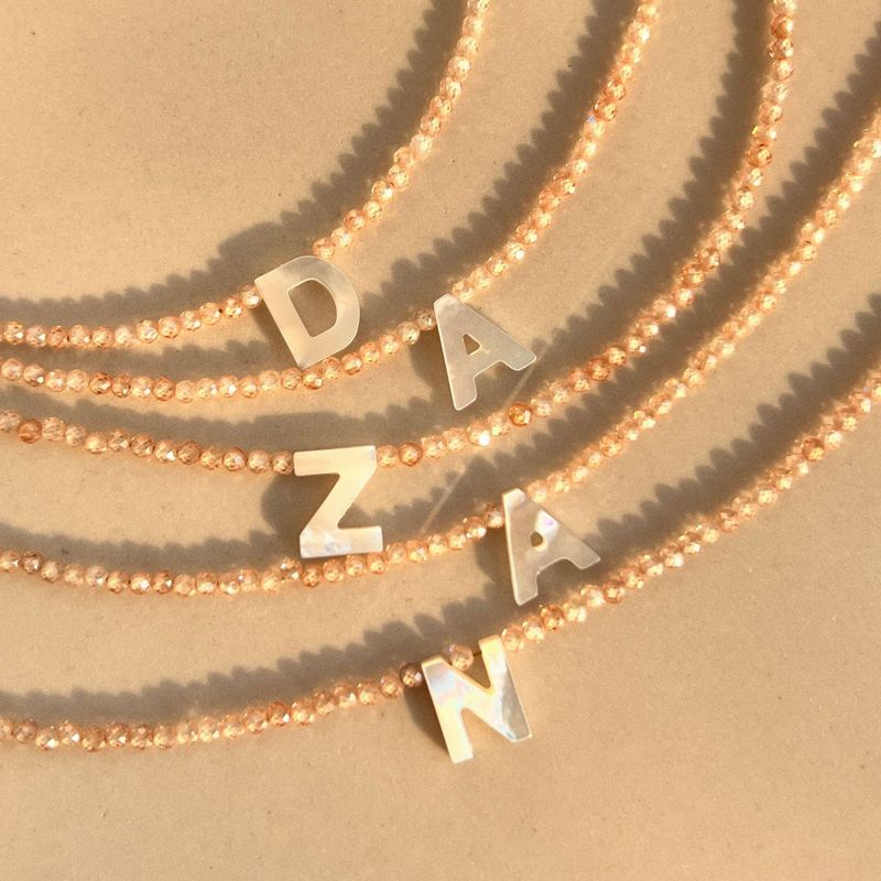 Einfacher Stil Brief Rostfreier Stahl Hülse Perlen Überzug Halskette Mit Anhänger