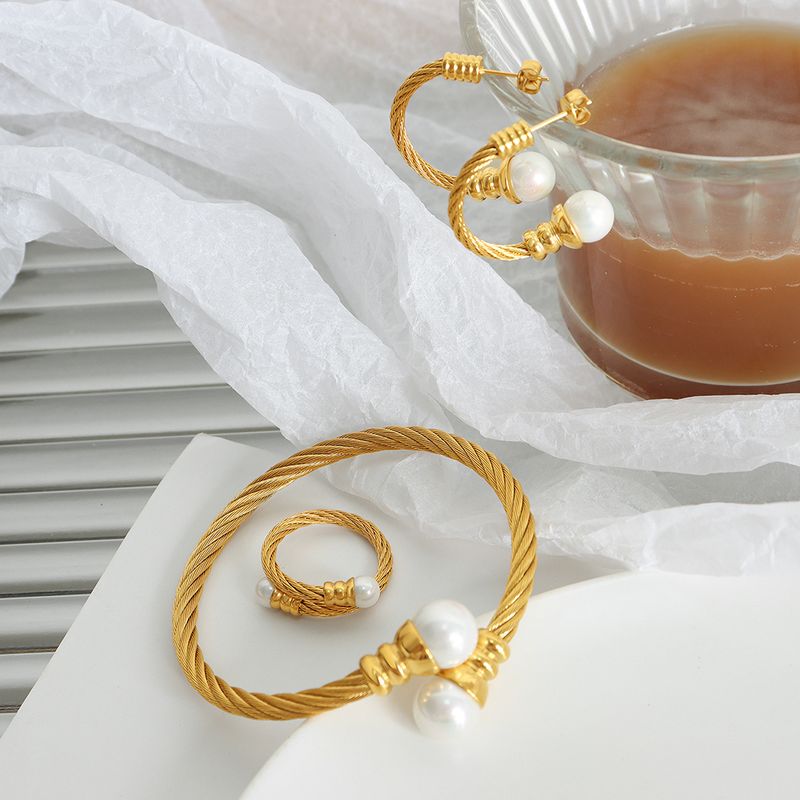 Großhandel Einfacher Stil Einfarbig Titan Stahl 18 Karat Vergoldet Ringe Armbänder Ohrringe