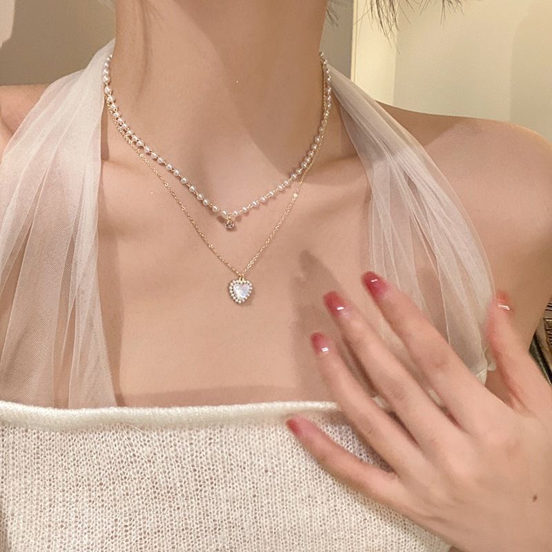 Einfacher Stil Herzform Legierung Kupfer Überzug Inlay Künstliche Perlen Frau Geschichtete Halskette