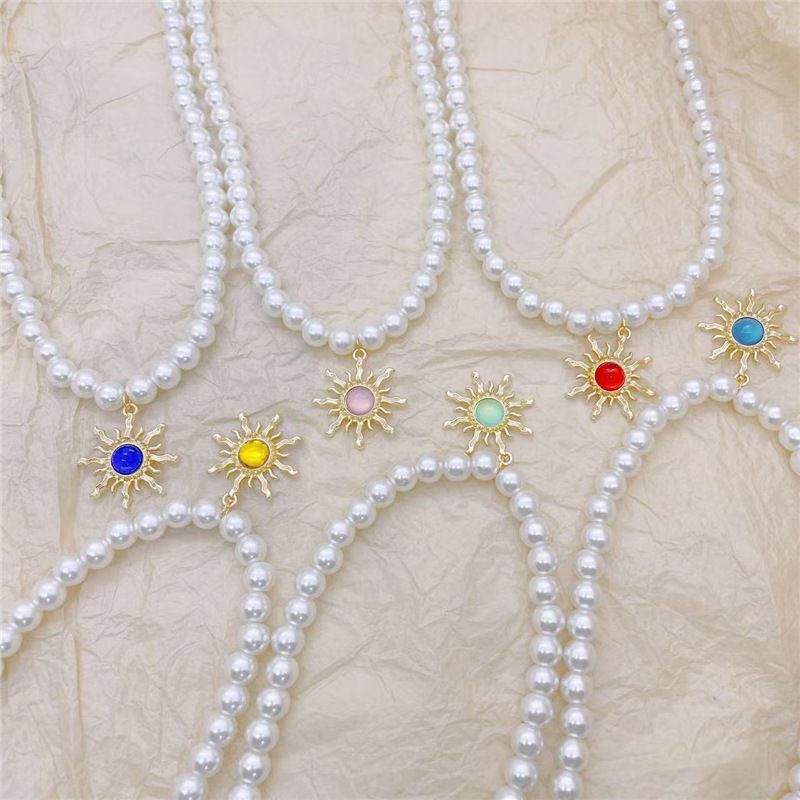 Elegant Sun Artificial Pearl Alloy Beaded Plating Inlay Artificial Gemstones Women's Pendant Necklace
