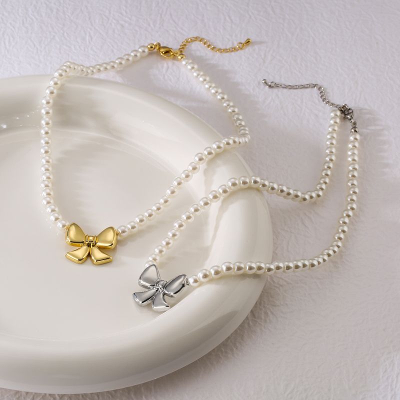 Elegant Bow Knot Imitation Pearl Copper Plating 18k Gold Plated Women's Necklace