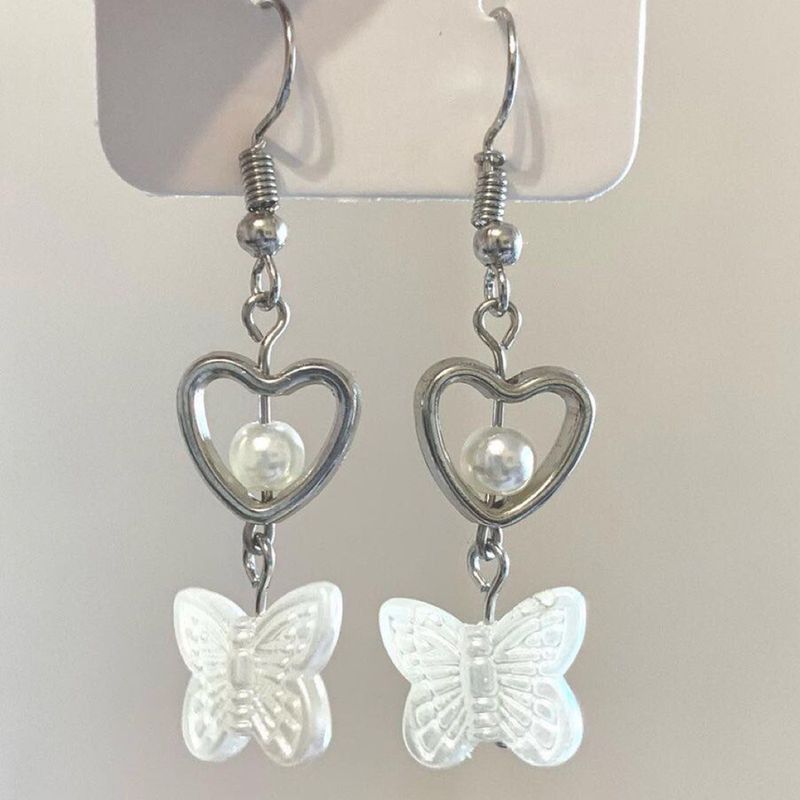 Style Simple Papillon Alliage Patchwork Femmes Boucles D'oreilles