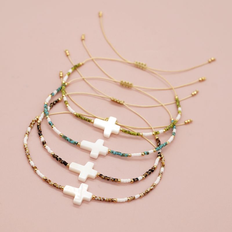 Einfacher Stil Klassischer Stil Kreuzen Glas Perlen Flechten Frau Männer Kordelzug Armbänder