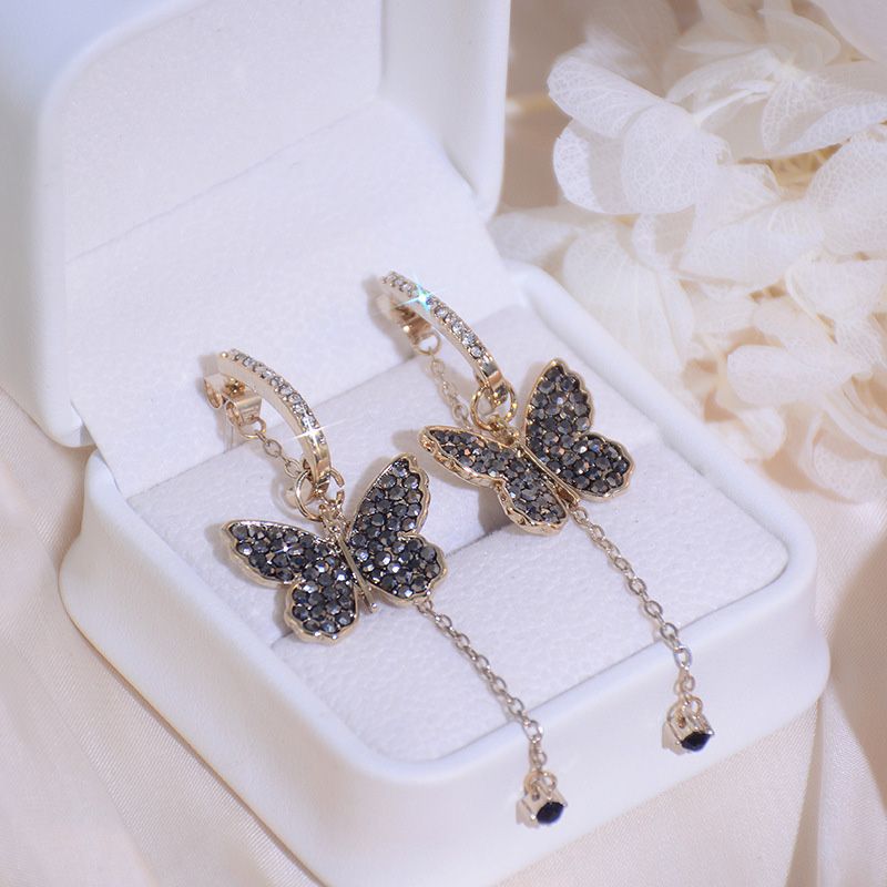 1 Par Estilo Vintage Exagerado Mariposa Embutido Cobre Diamantes De Imitación Pendientes De Gota