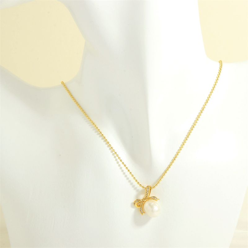 Elegant Simple Style Bow Knot Freshwater Pearl Copper Plating Inlay Zircon 18k Gold Plated Pendant Necklace