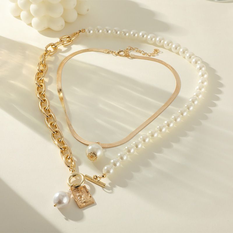 Großhandel Schmuck Süss Einfarbig Legierung Eisen Künstliche Perlen Überzug Inlay Halskette Mit Anhänger Halskette