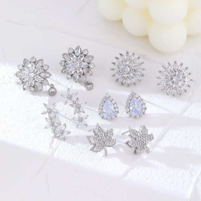 1 Pair Glam Simple Style Water Droplets Flower Snowflake Irregular Plating Inlay Copper Zircon Rhodium Plated Ear Studs