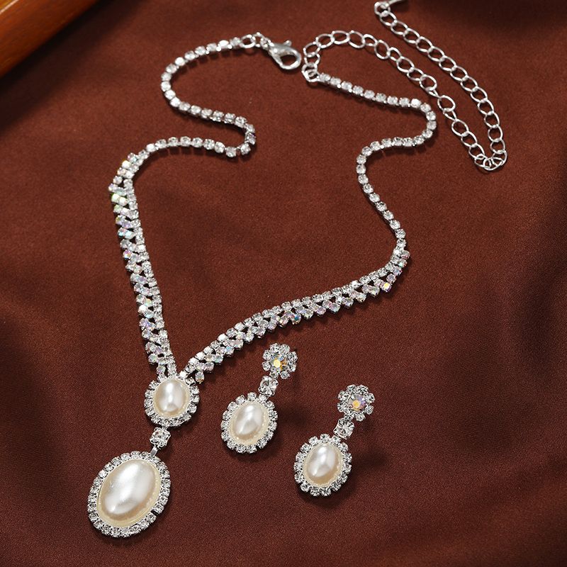 Élégant Mariage De Mariée Couleur Unie Fleur Alliage Incruster Perles Artificielles Diamant Artificiel Femmes Ensemble De Bijoux