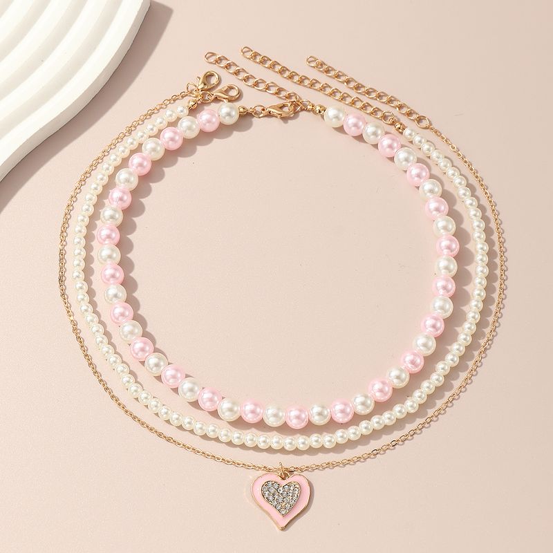 Cute Sweet Heart Shape Artificial Diamond Artificial Pearl Metal Wholesale Pendant Necklace Necklace