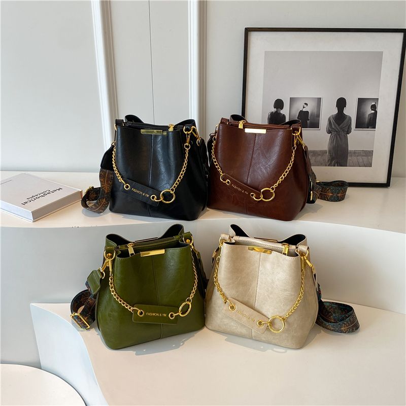 Women's All Seasons Pu Leather Solid Color Elegant Sewing Thread Bucket Zipper Bucket Bag