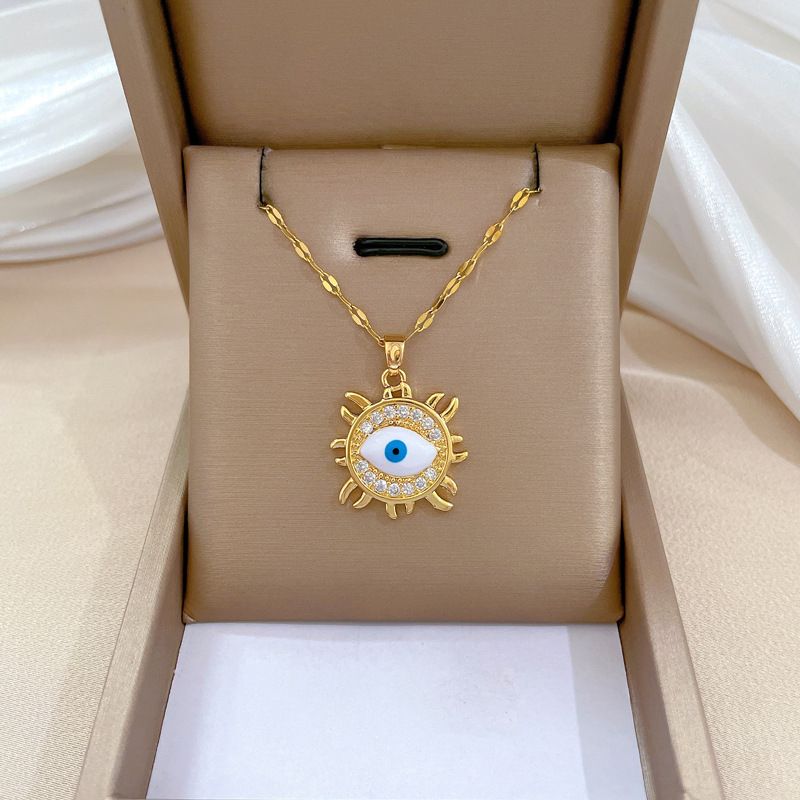 Wholesale IG Style Simple Style Sun Devil'S Eye Titanium Steel Copper Plating Inlay Artificial Gemstones Pendant Necklace