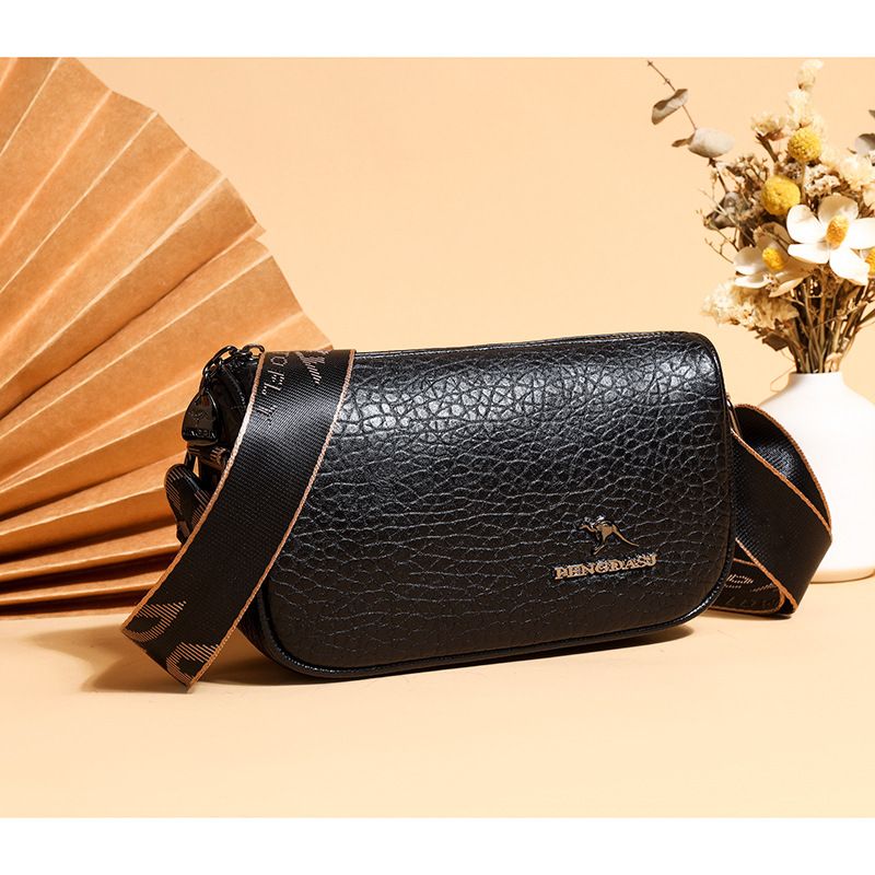 Women's Medium Leather Solid Color Vintage Style Cylindrical Zipper Shoulder Bag Crossbody Bag