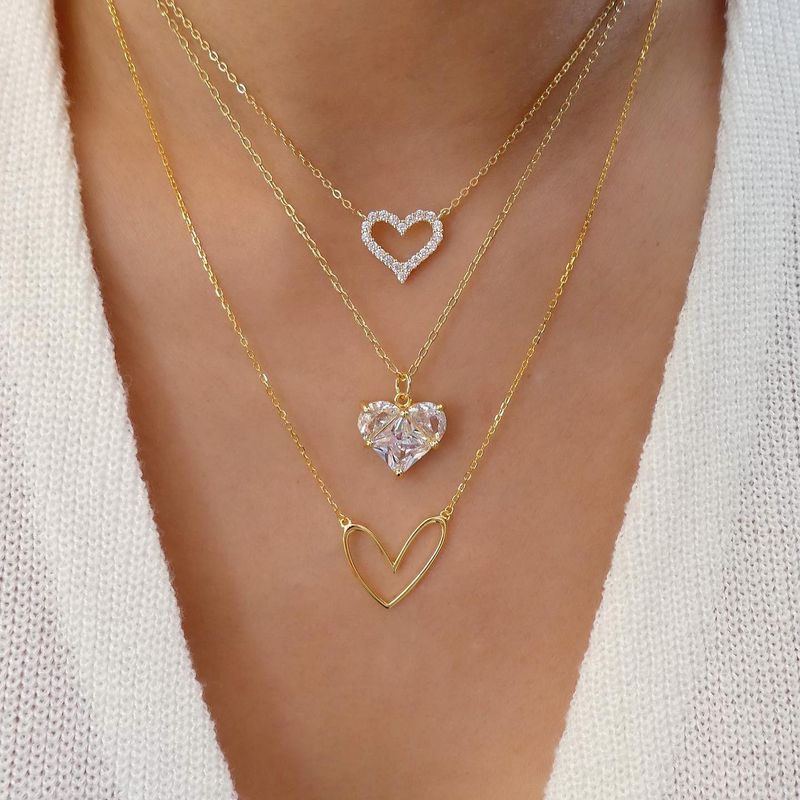 Estilo Ig Estrella Luna Forma De Corazón Aleación Ahuecar Embutido Diamantes De Imitación Mujeres Collar De Tres Capas