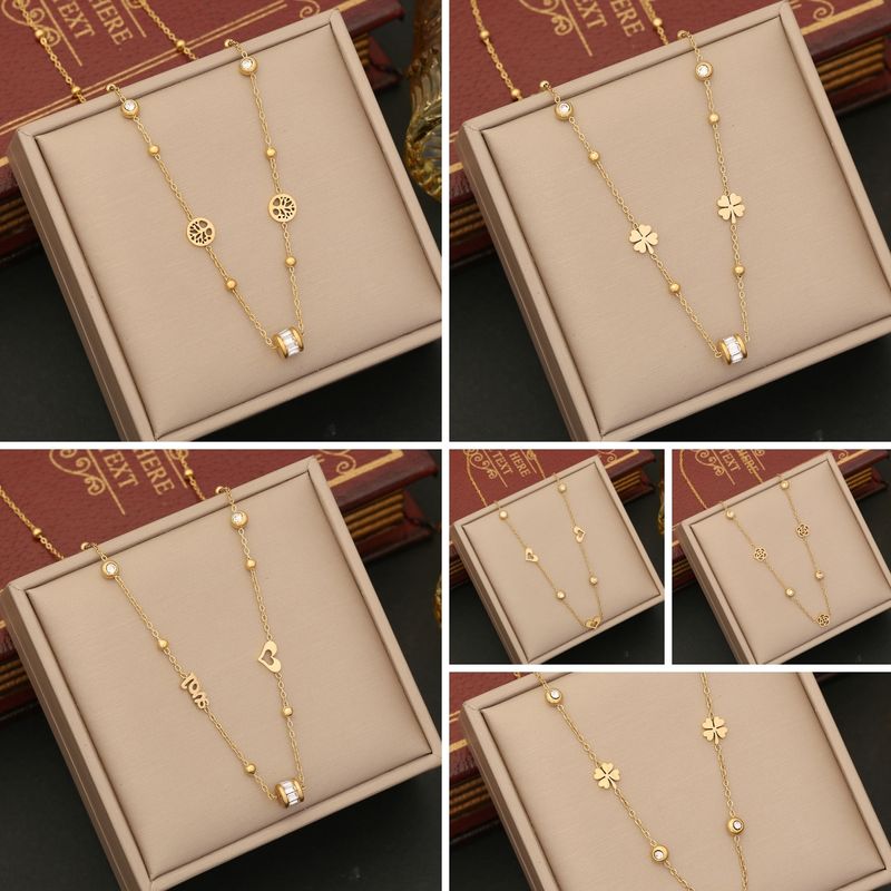 Venta Al Por Mayor Estilo Simple Viajar Diariamente Forma De Corazón Acero Inoxidable Enchapado Embutido Chapados en oro de 18k Circón Collar Colgante