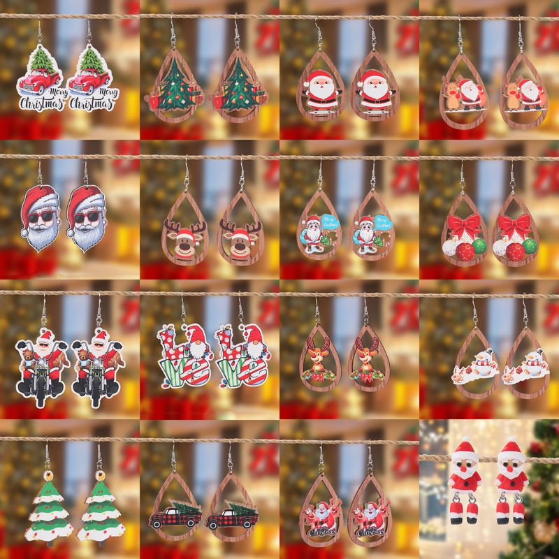 1 Pair Christmas Streetwear Santa Claus Snowflake Elk Arylic Wood Drop Earrings Earrings Ear Studs