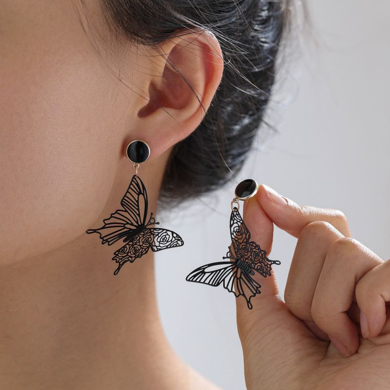 1 Paire Style Ig Style Simple Papillon Placage Évider Métal Boucles D'oreilles