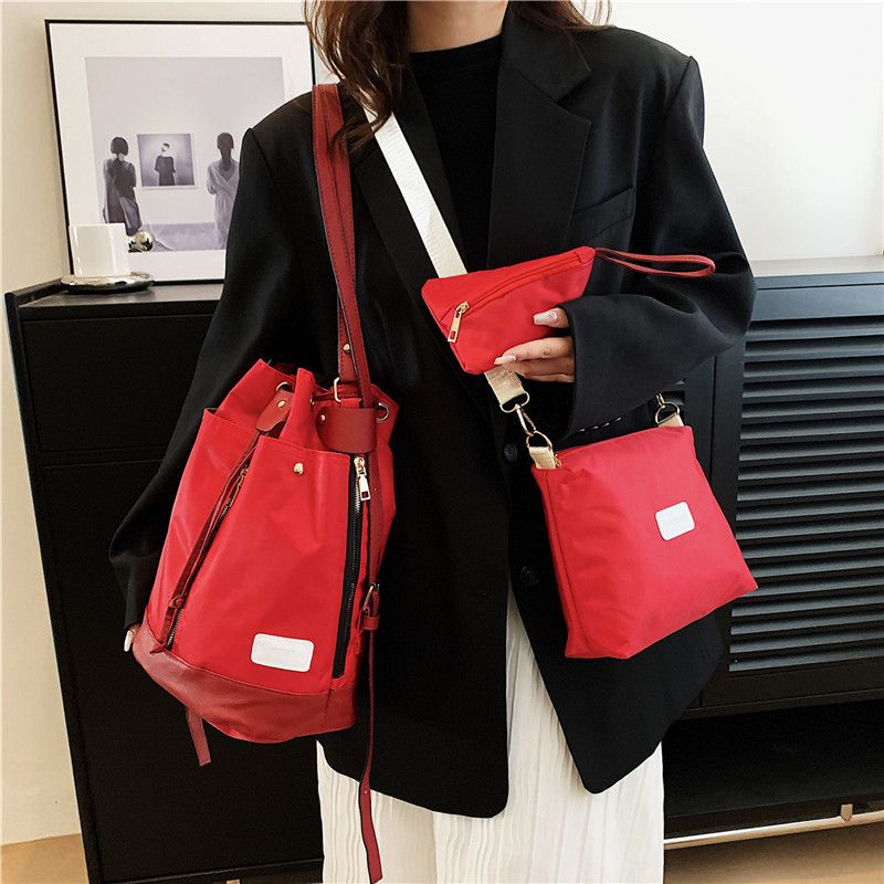 Women's Nylon Solid Color Streetwear Oval String Shoulder Bag