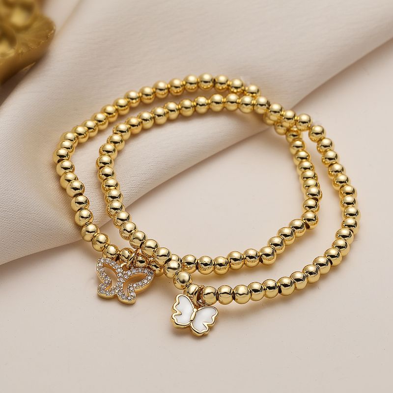 Elegante Estilo Simple Mariposa Cobre Con Cuentas Enchapado Embutido Circón Pulsera