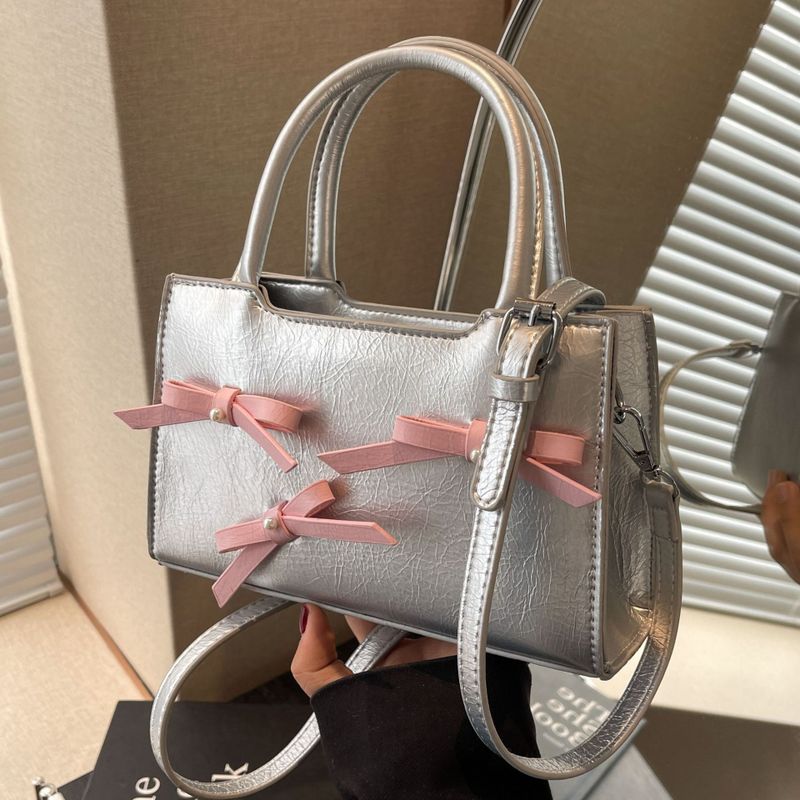 Women's Medium Pu Leather Bow Knot Elegant Zipper Handbag