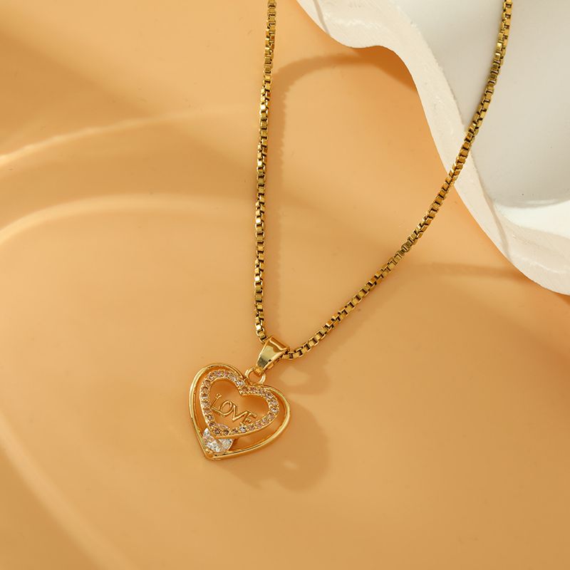 Großhandel Elegant Herzform Künstliche Feder Messing Inlay 18 Karat Vergoldet Zirkon Halskette Mit Anhänger
