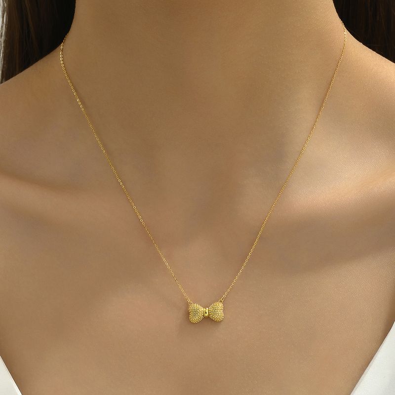 Simple Style Classic Style Bow Knot Alloy Copper Plating Gold Plated Women's Pendant Necklace