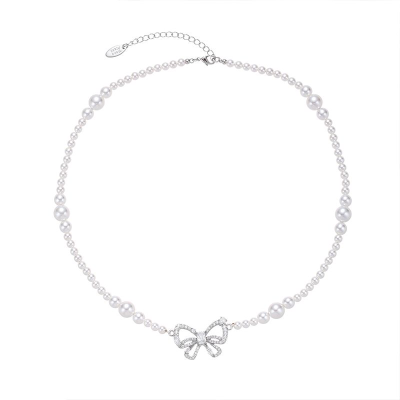 Sweet Simple Style Bow Knot Imitation Pearl Brass Zircon White Gold Plated Women's Pendant Necklace
