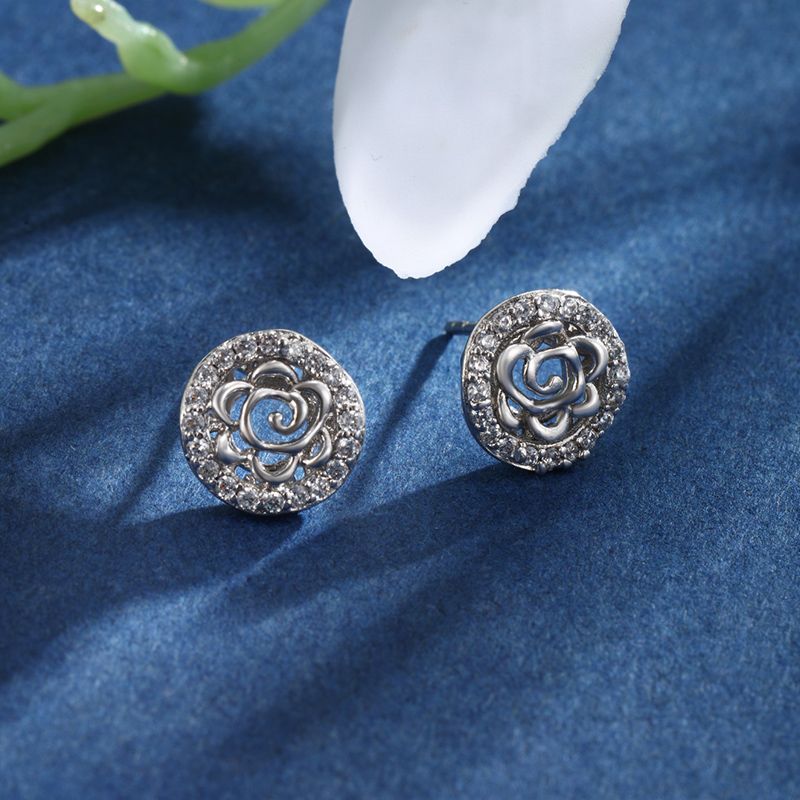 1 Pair XUPING Sweet Shiny Round Flower Hollow Out Inlay Alloy Copper Alloy Artificial Gemstones White Gold Plated Ear Studs