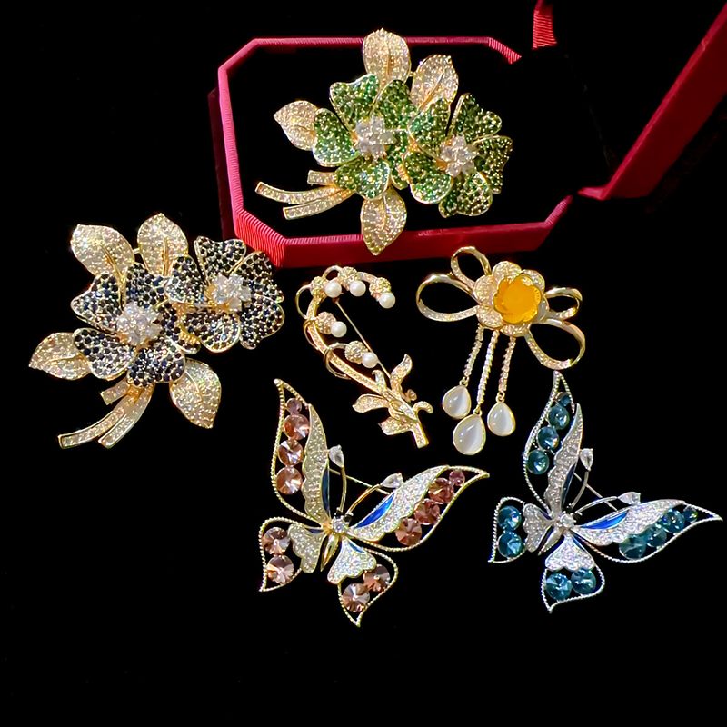 IG Style Simple Style Shiny Flower Butterfly Copper Plating Inlay Artificial Gemstones Zircon Unisex Brooches