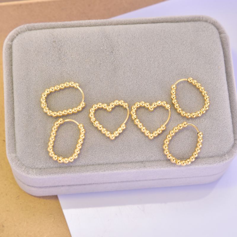 1 Par Estilo Simple Geométrico Ronda Forma De Corazón Acero Titanio Chapados en oro de 18k Pendientes De Aro