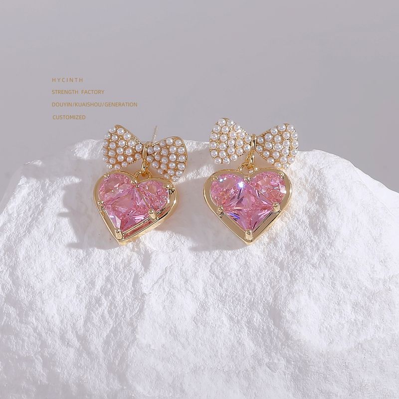 1 Par Elegante Dulce Brillante Forma De Corazón Nudo De Lazo Embutido Cobre Perla Circón Chapados en oro de 18k Pendientes De Gota Puños De Oreja