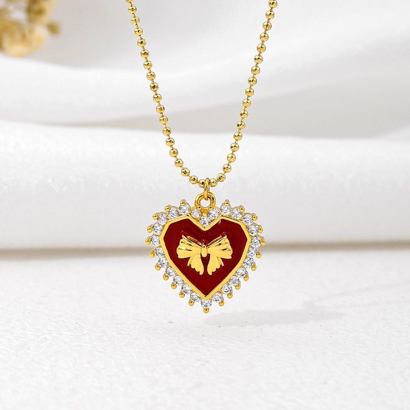 Kupfer 18 Karat Vergoldet Einfacher Stil Klassischer Stil Überzug Inlay Herzform Bogenknoten Zirkon Halskette Mit Anhänger