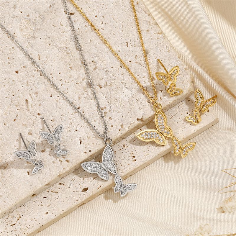Cobre Chapados en oro de 18k Estilo IG Brillante Embutido Mariposa Circón Conjunto De Joyas