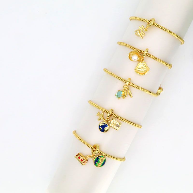 Kupfer 18 Karat Vergoldet Süß Einfacher Stil Inlay Geometrisch Künstliche Perlen Zirkon Armbänder