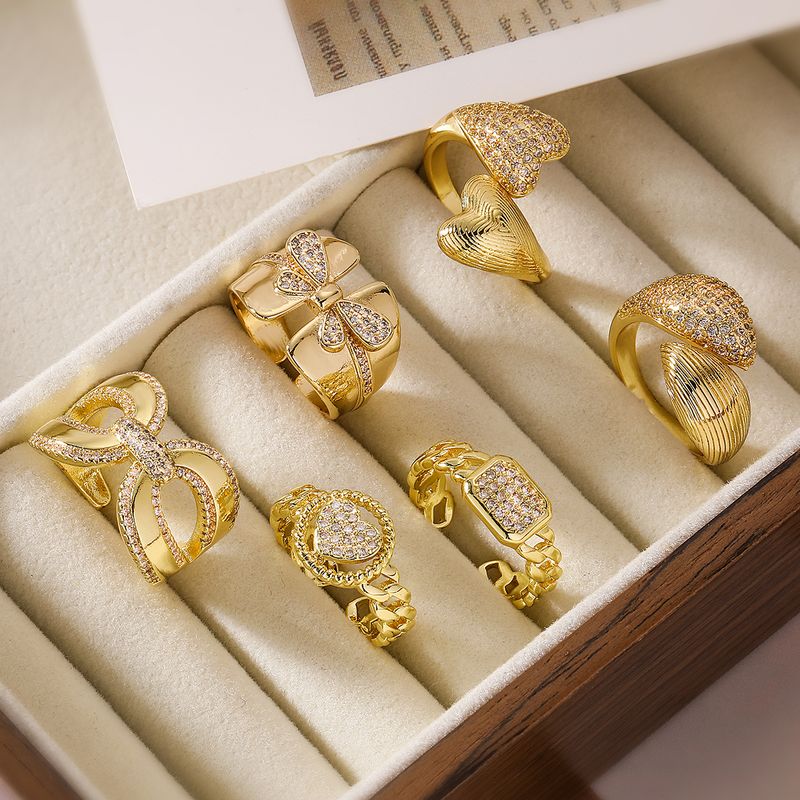 Großhandel Einfacher Stil Pendeln Geometrisch Herzform Kupfer Aushöhlen Inlay 18 Karat Vergoldet Zirkon Offener Ring