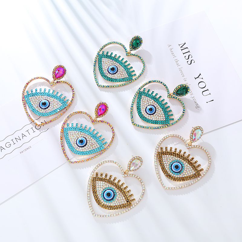 1 Pair Hip-Hop Exaggerated Modern Style Devil's Eye Heart Shape Hollow Out Inlay Alloy Rhinestones Drop Earrings