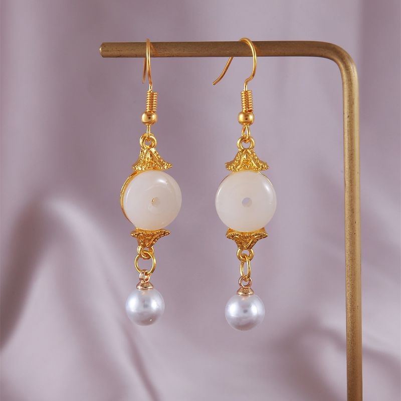 1 Pair Simple Style Classic Style Solid Color Patchwork Hollow Out Synthetic Gemstones Imitation Pearl Alloy Resin Zircon Drop Earrings
