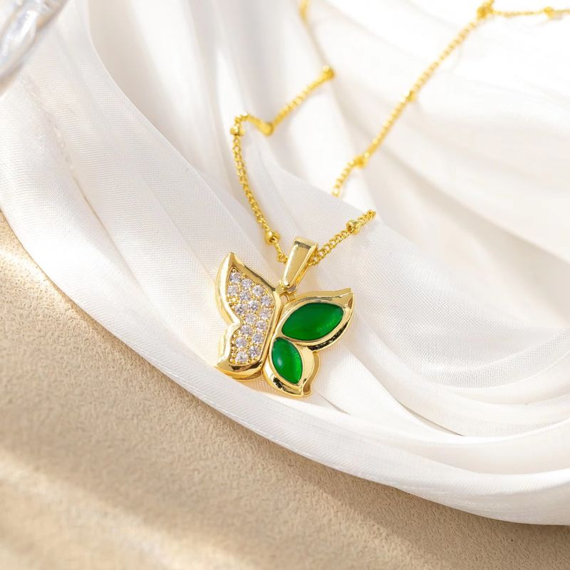 Copper K Gold Plated Elegant Simple Style Plating Inlay Four Leaf Clover Butterfly Fish Tail Rhinestones Pendant Necklace