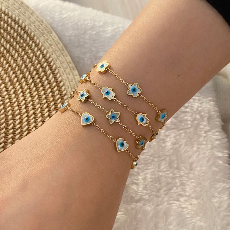 Élégant Mignon Star Fleur Acier Inoxydable 304 Plaqué Or 18K Bracelets En Masse