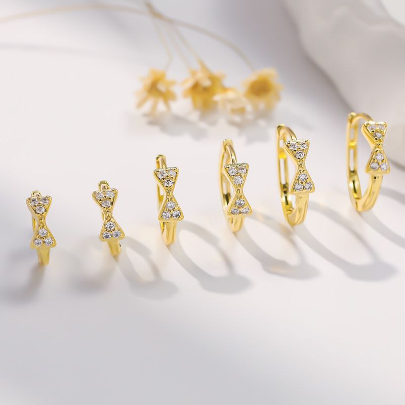 1 Paire Sucré Style Simple Nœud Papillon Incruster Le Cuivre Zircon Boucles D'oreilles Cerceau