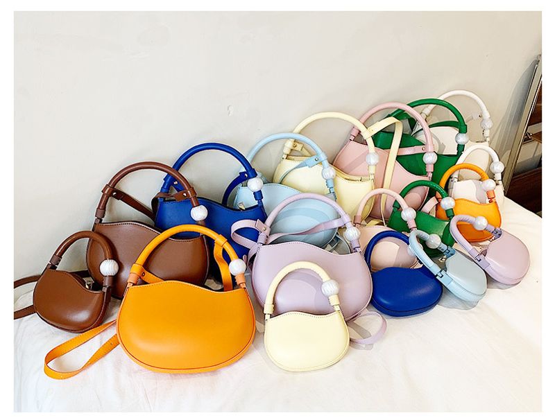 Women's Mini Pu Leather Solid Color Streetwear Oval Zipper Handbag Crossbody Bag