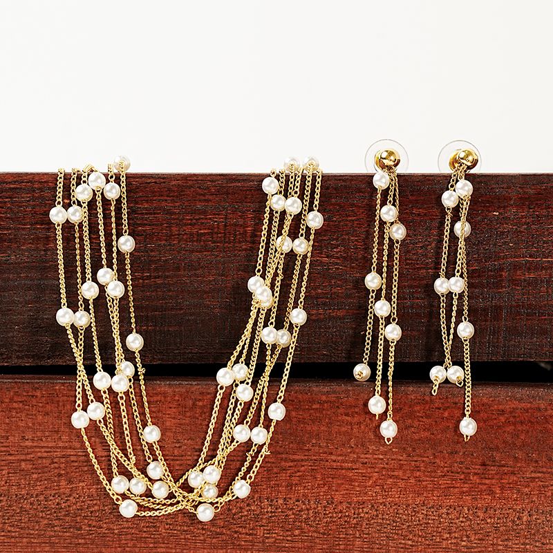 Cobre Chapados en oro de 18k Elegante Glamour Geométrico Con Cuentas Embutido Perlas Artificiales Aretes Collar