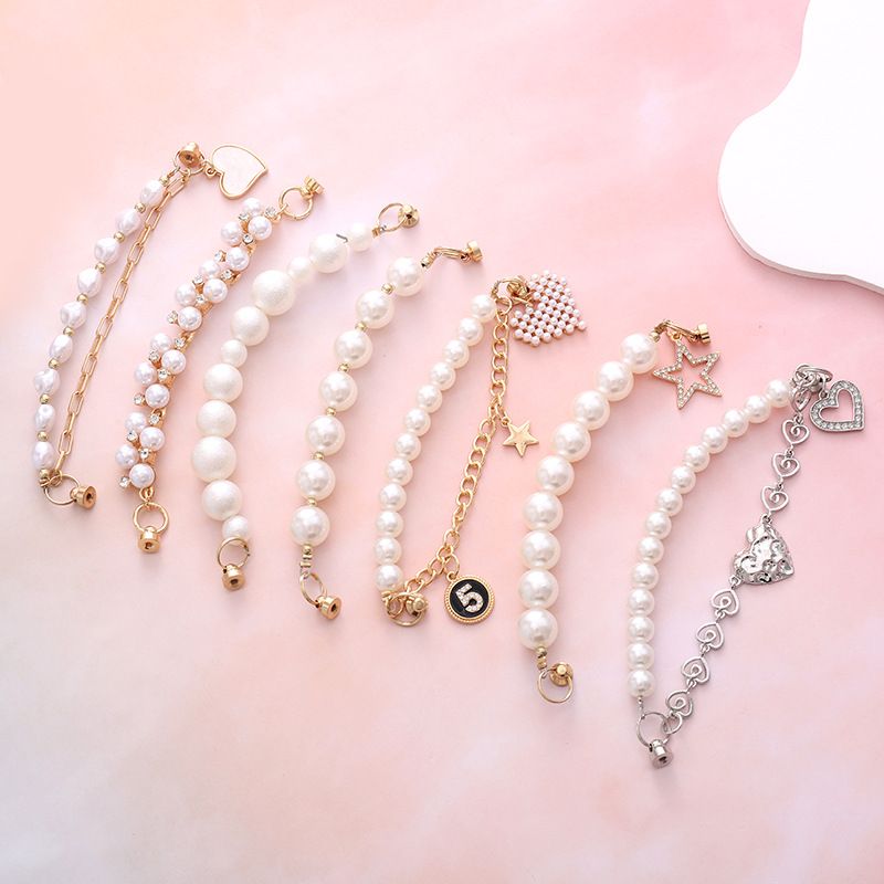 Simple Style Heart Shape Bow Knot Imitation Pearl Beaded Plating Inlay Rhinestones Mobile Phone Chain