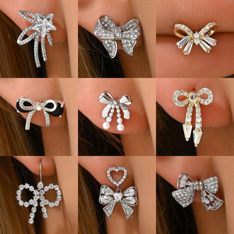 1 Pair Sweet Shiny Bow Knot Hollow Out Inlay Copper Zircon White Gold Plated Gold Plated Ear Studs