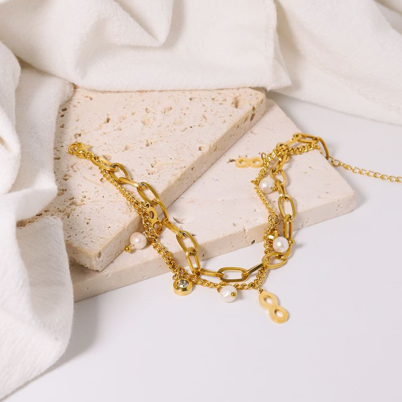 Titan Stahl 18 Karat Vergoldet Lässig Einfacher Stil Perle Aushöhlen Inlay Kreuzen Unendlichkeit Herzform Zirkon Armbänder
