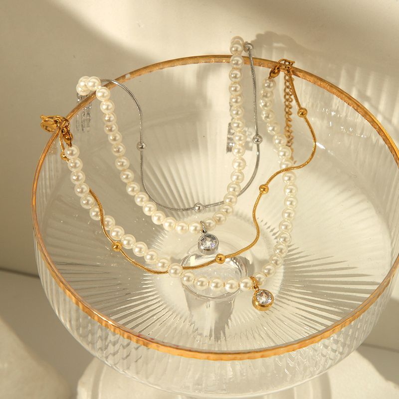 Acier Inoxydable 304 De Base Style Baroque Style Classique Placage Incruster Géométrique Perles Artificielles Zircon Bracelets