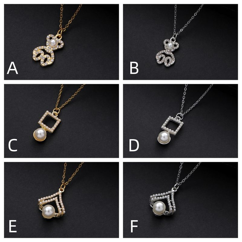 Wholesale Jewelry Cute Shiny Geometric Bear Heart Shape Alloy Rhinestones Pearl Hollow Out Inlay Pendant Necklace