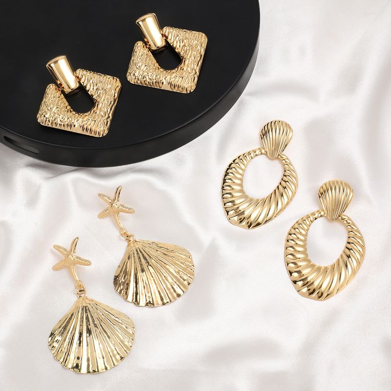 1 Pair Casual Simple Style Classic Style Oval Starfish Shell Alloy Drop Earrings