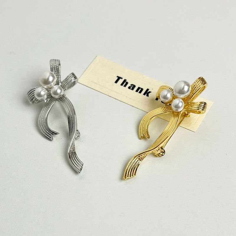 IG Style Sweet Bow Knot Metal Asymmetrical Inlay Artificial Pearls Women's Brooches