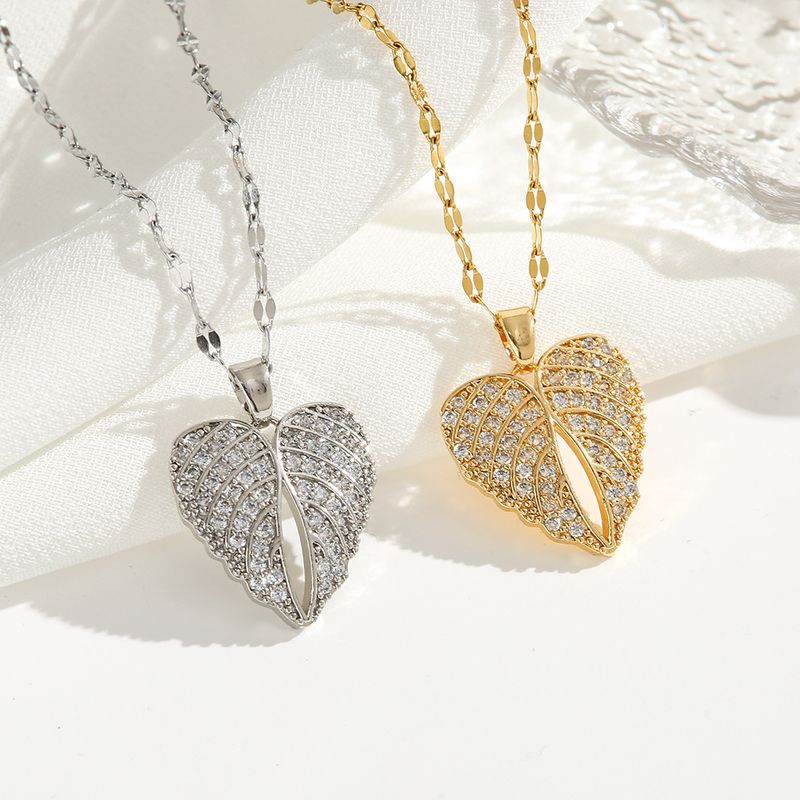 Wholesale Exaggerated Shiny Heart Shape Wings Titanium Steel Copper Inlay Zircon Pendant Necklace