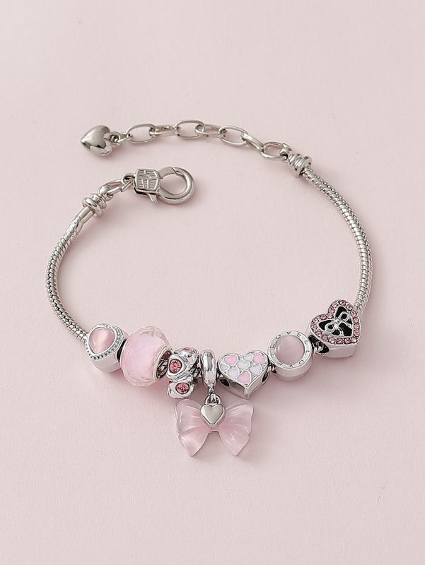 Sweet Simple Style Heart Shape Bow Knot Synthetic Resin Alloy Copper Inlay Carving Rhinestones Women's Bracelets